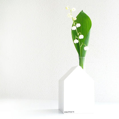 Serra M | Casa con provetta come vaso